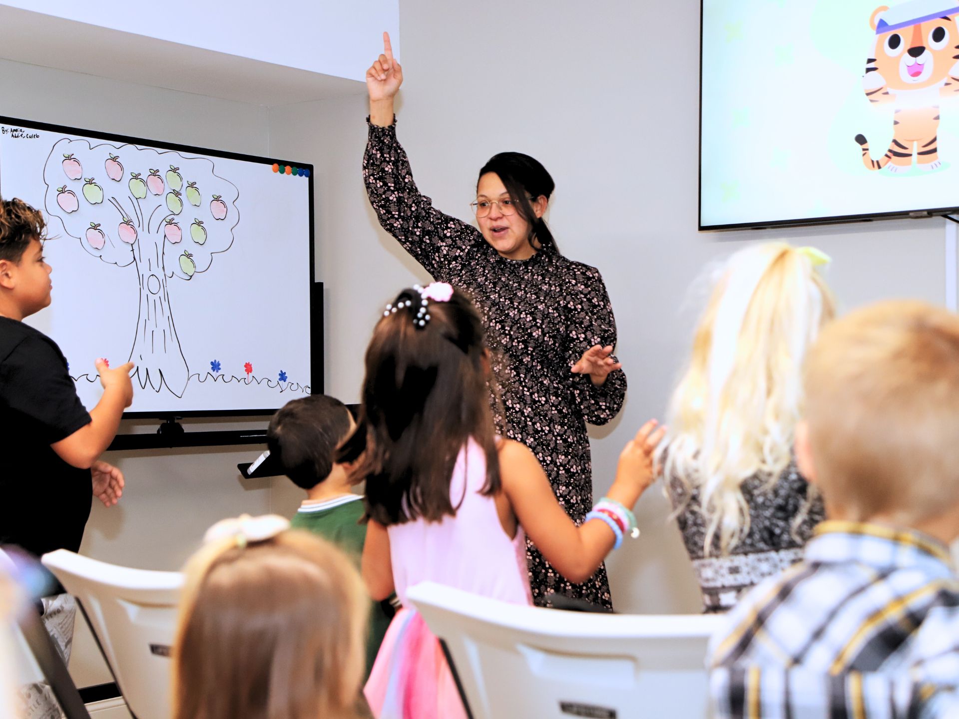 A Tampa Kids teacher leading a lesson
